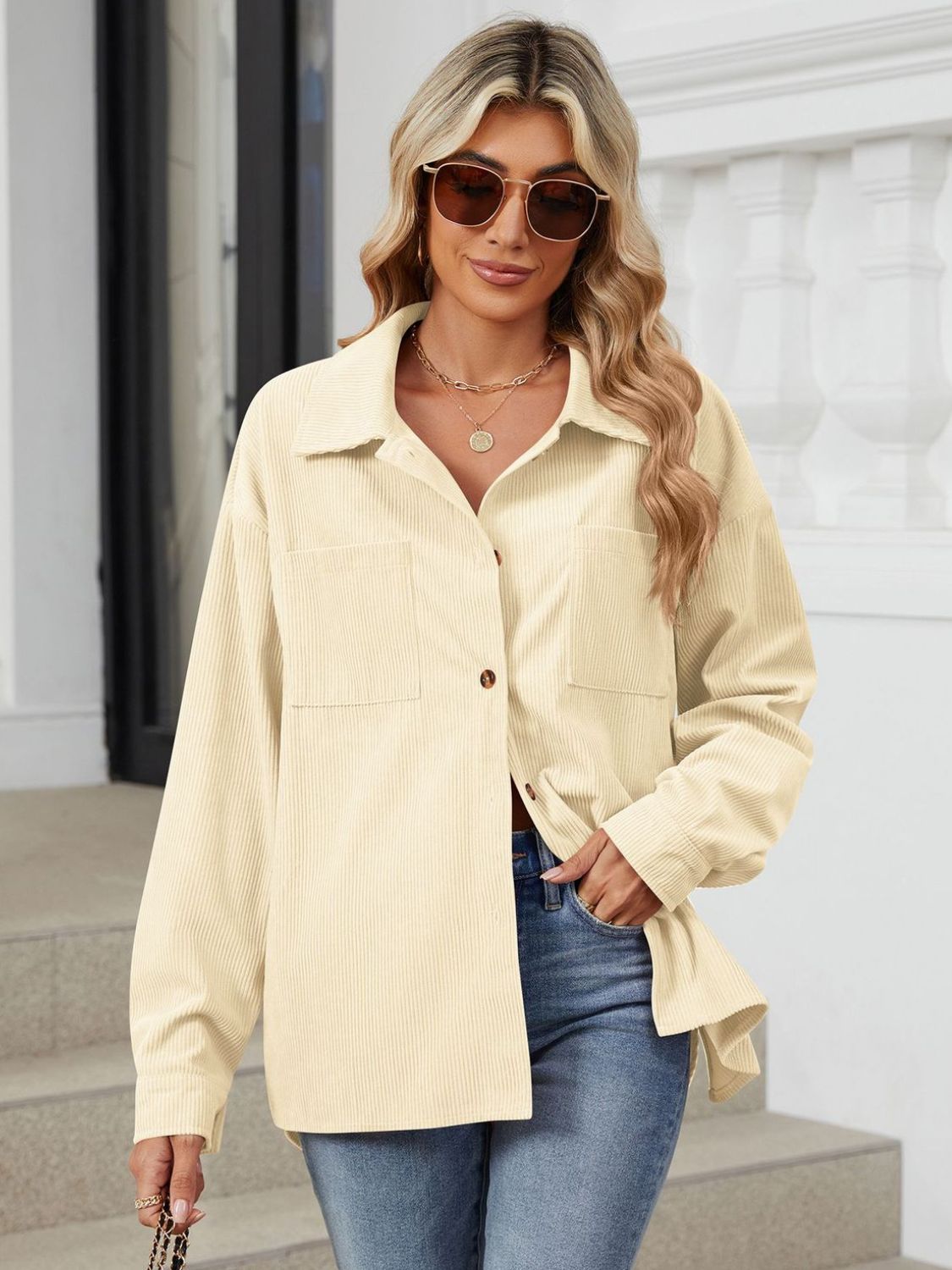 Button up long sleeve shirt with breast pockets.