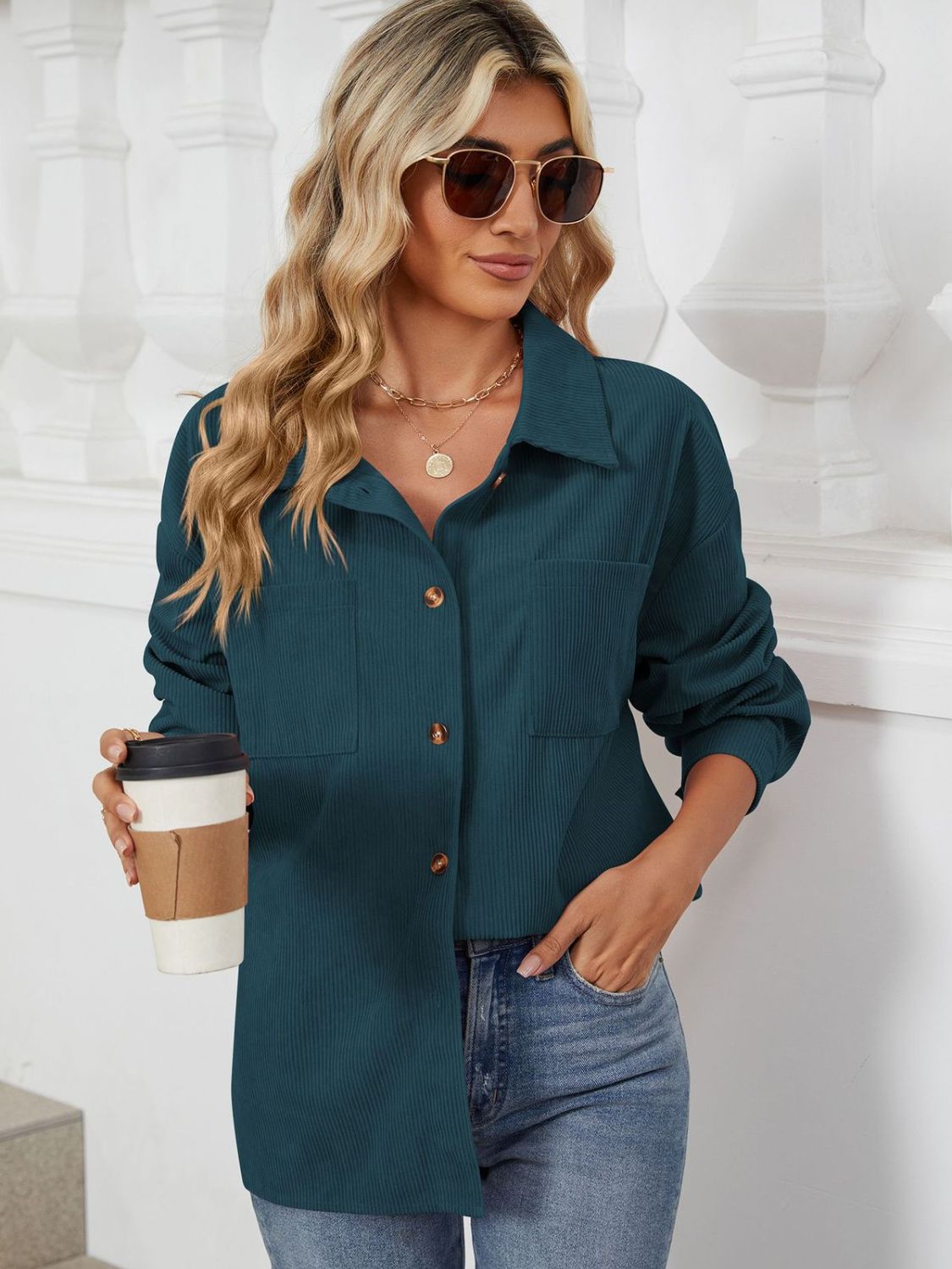 Button up long sleeve shirt with breast pockets.