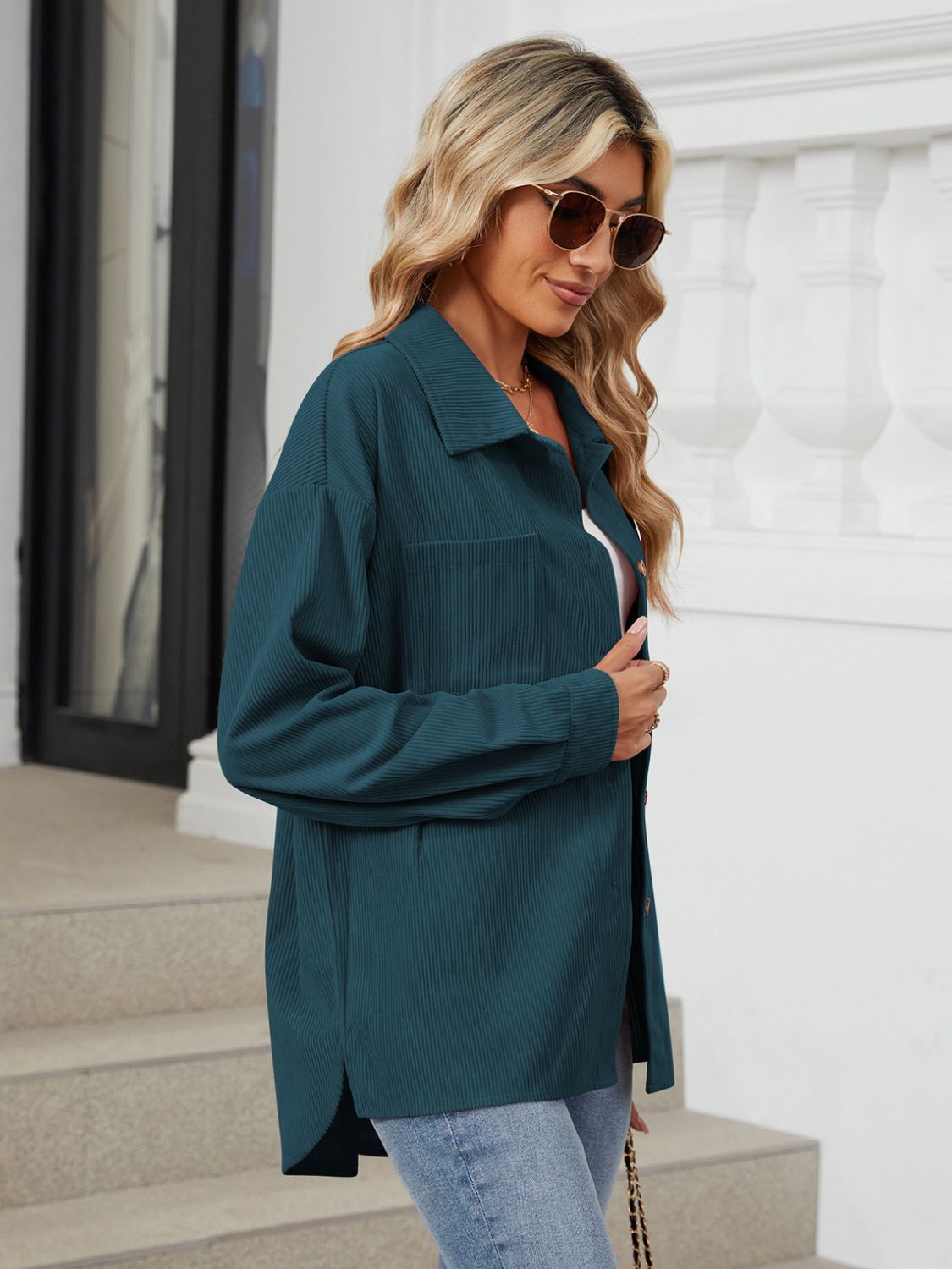 Button up long sleeve shirt with breast pockets.