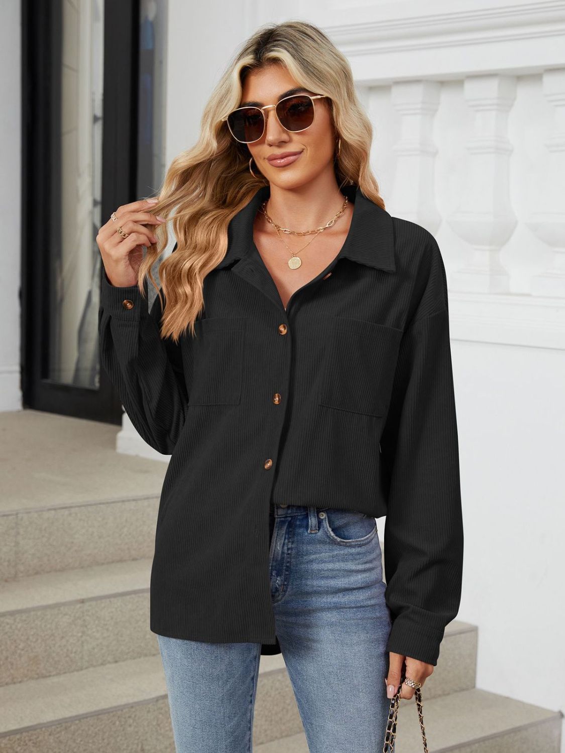 Button up long sleeve shirt with breast pockets.