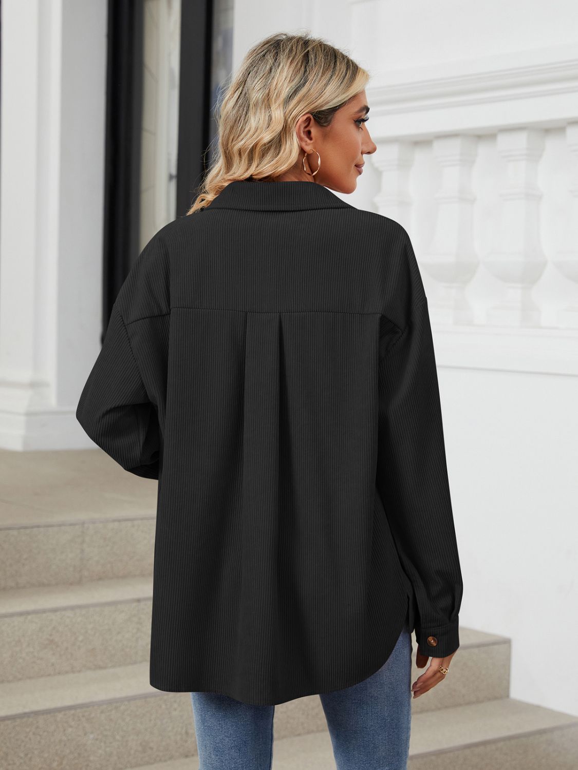 Button up long sleeve shirt with breast pockets.