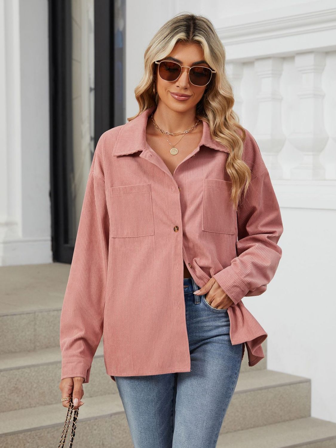 Button up long sleeve shirt with breast pockets.