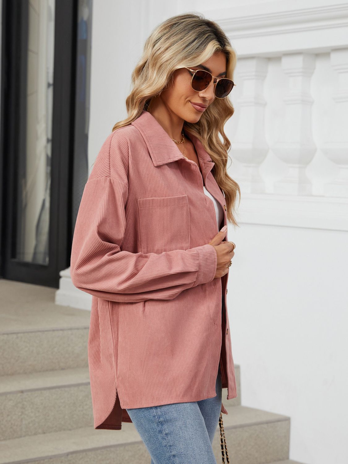 Button up long sleeve shirt with breast pockets.