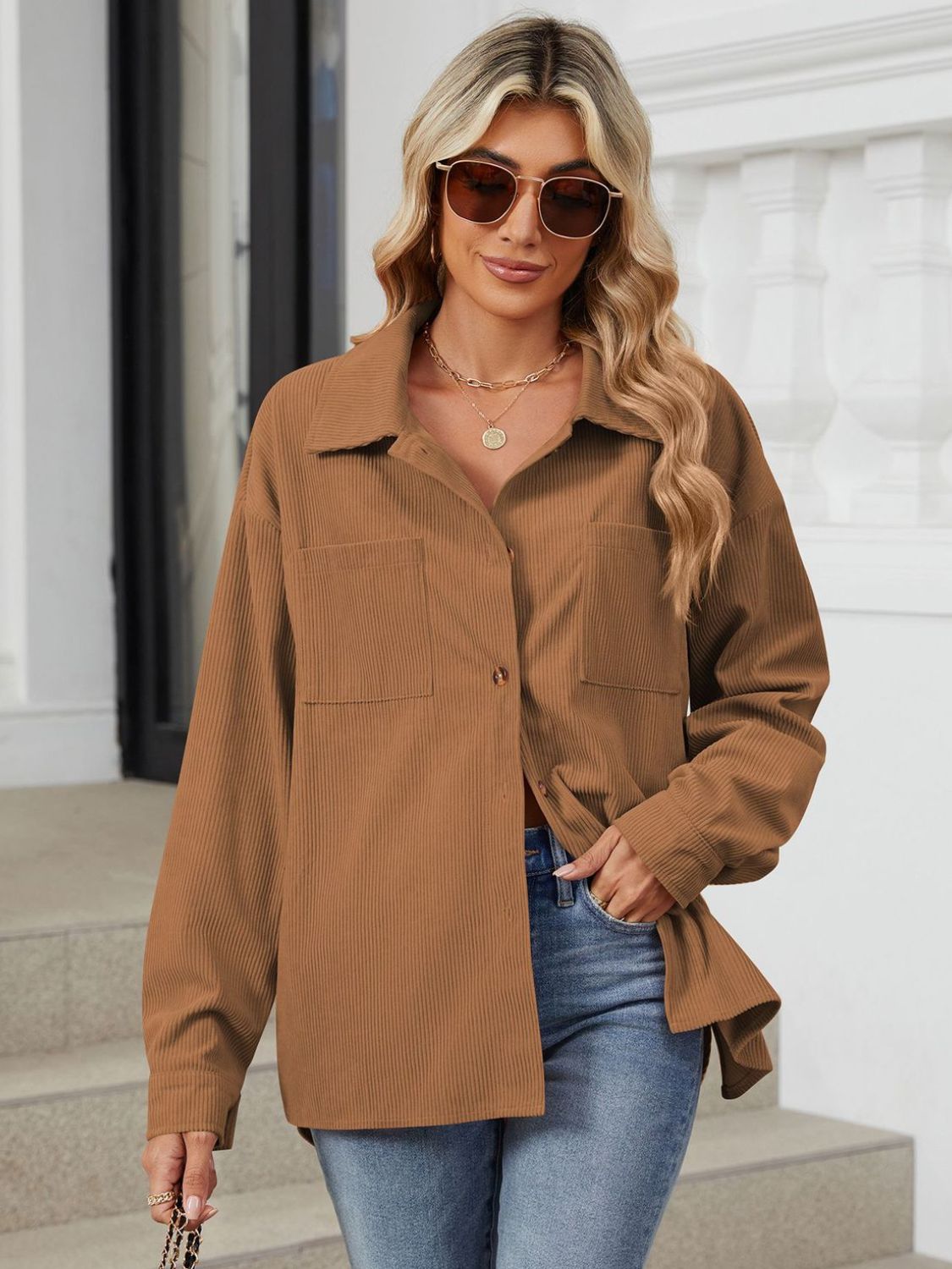 Button up long sleeve shirt with breast pockets.
