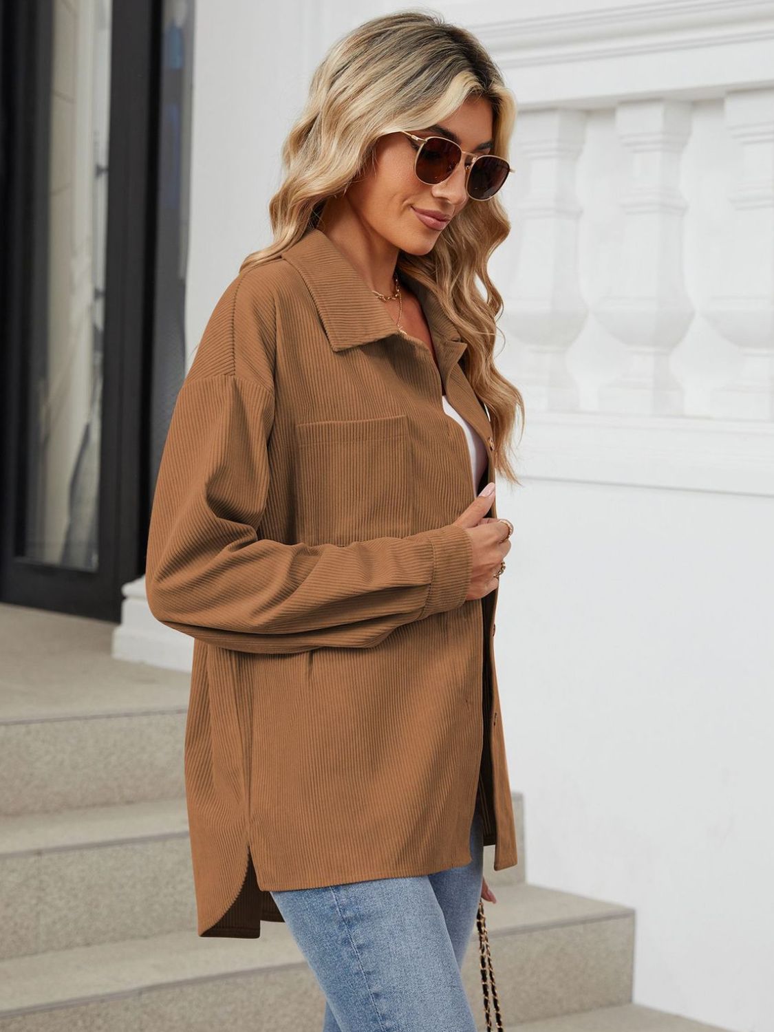 Button up long sleeve shirt with breast pockets.