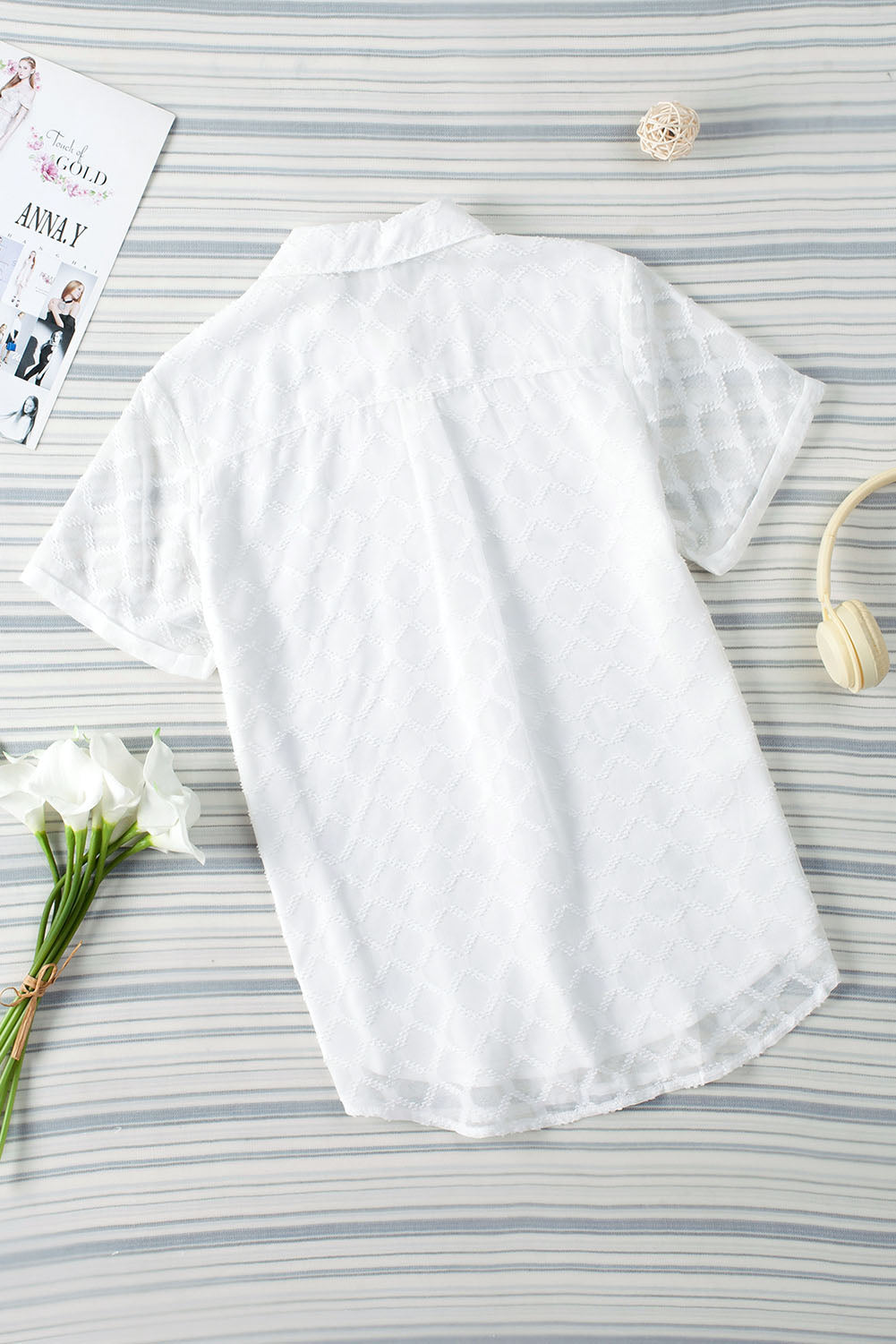 Button up short sleeve shirt.
