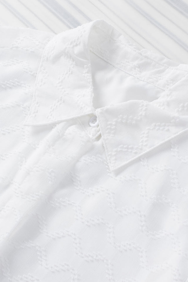 Button up short sleeve shirt.