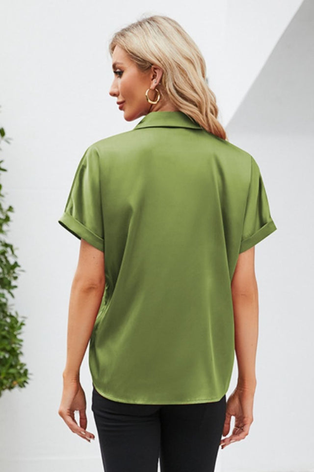 Button up short sleeve shirt.