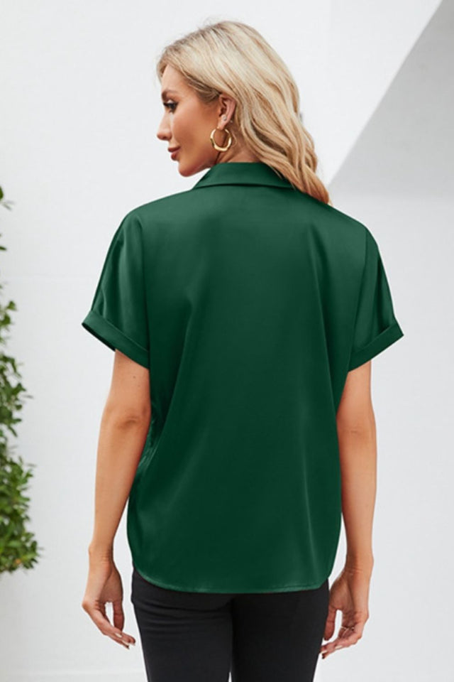 Button up short sleeve shirt.