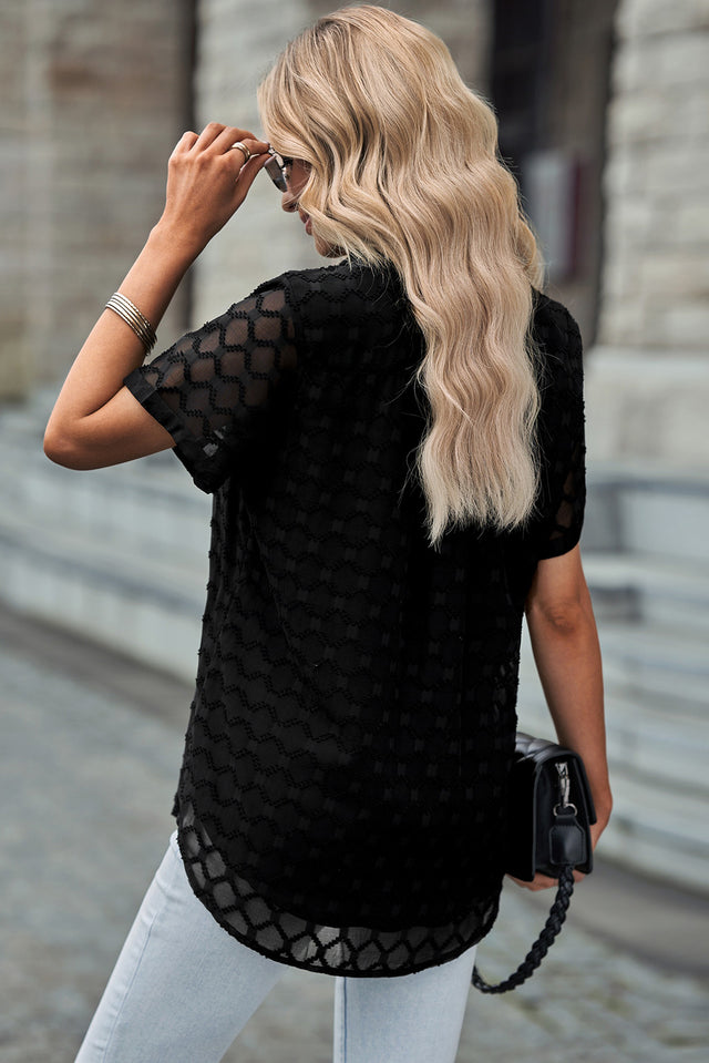Button up short sleeve shirt.