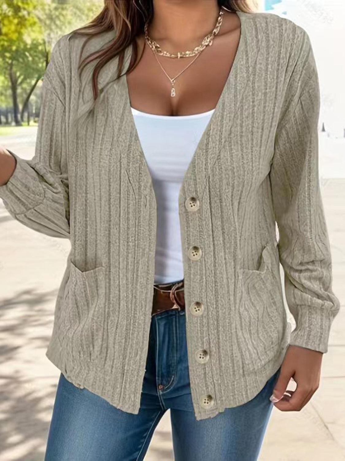 Full size button up V-neck long sleeve cardigan with pockets.
