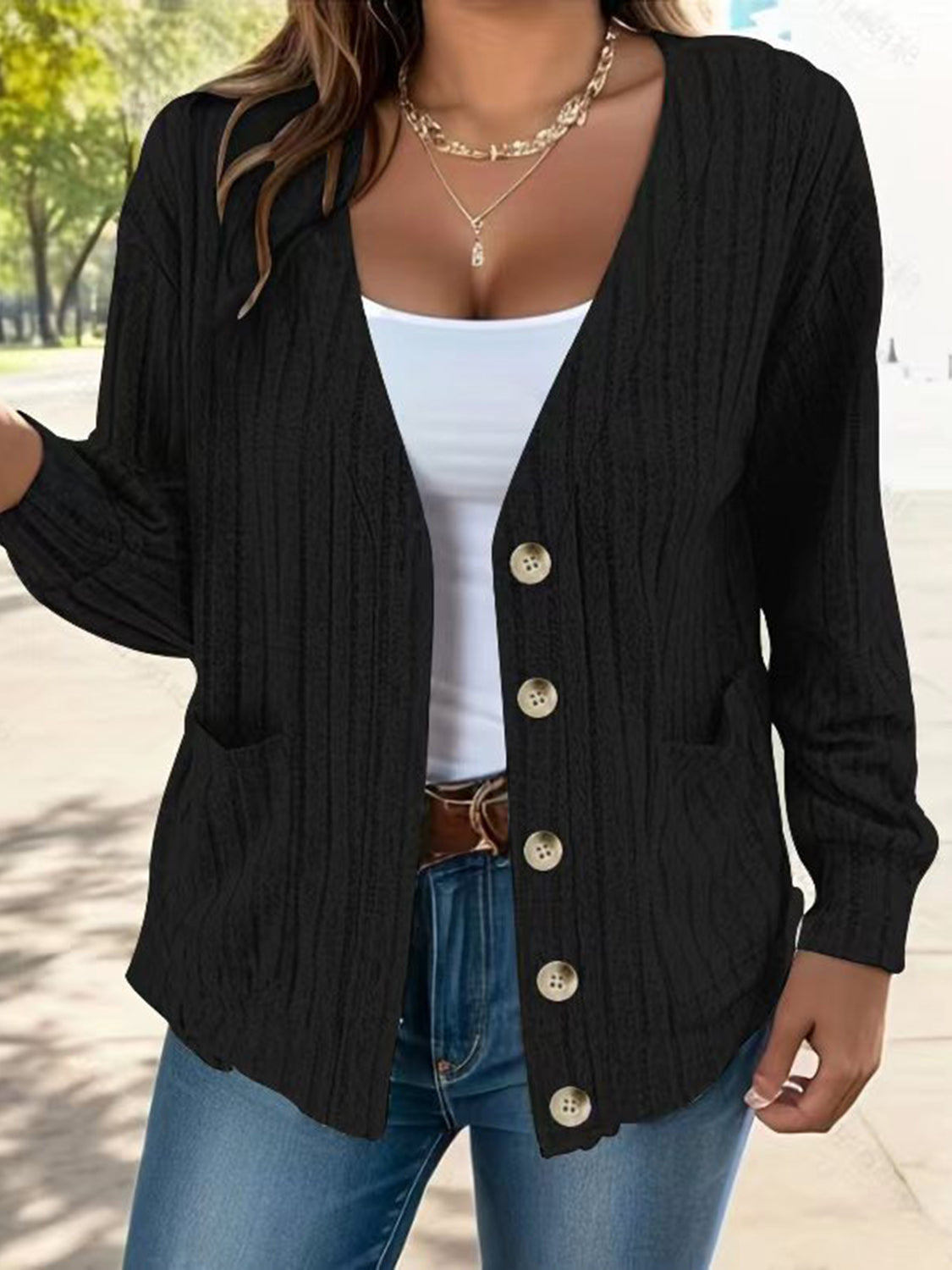 Full size button up V-neck long sleeve cardigan with pockets.
