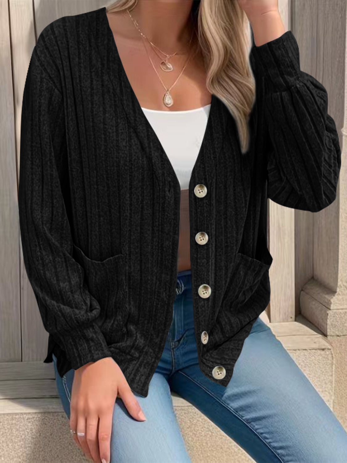 Full size button up V-neck long sleeve cardigan with pockets.