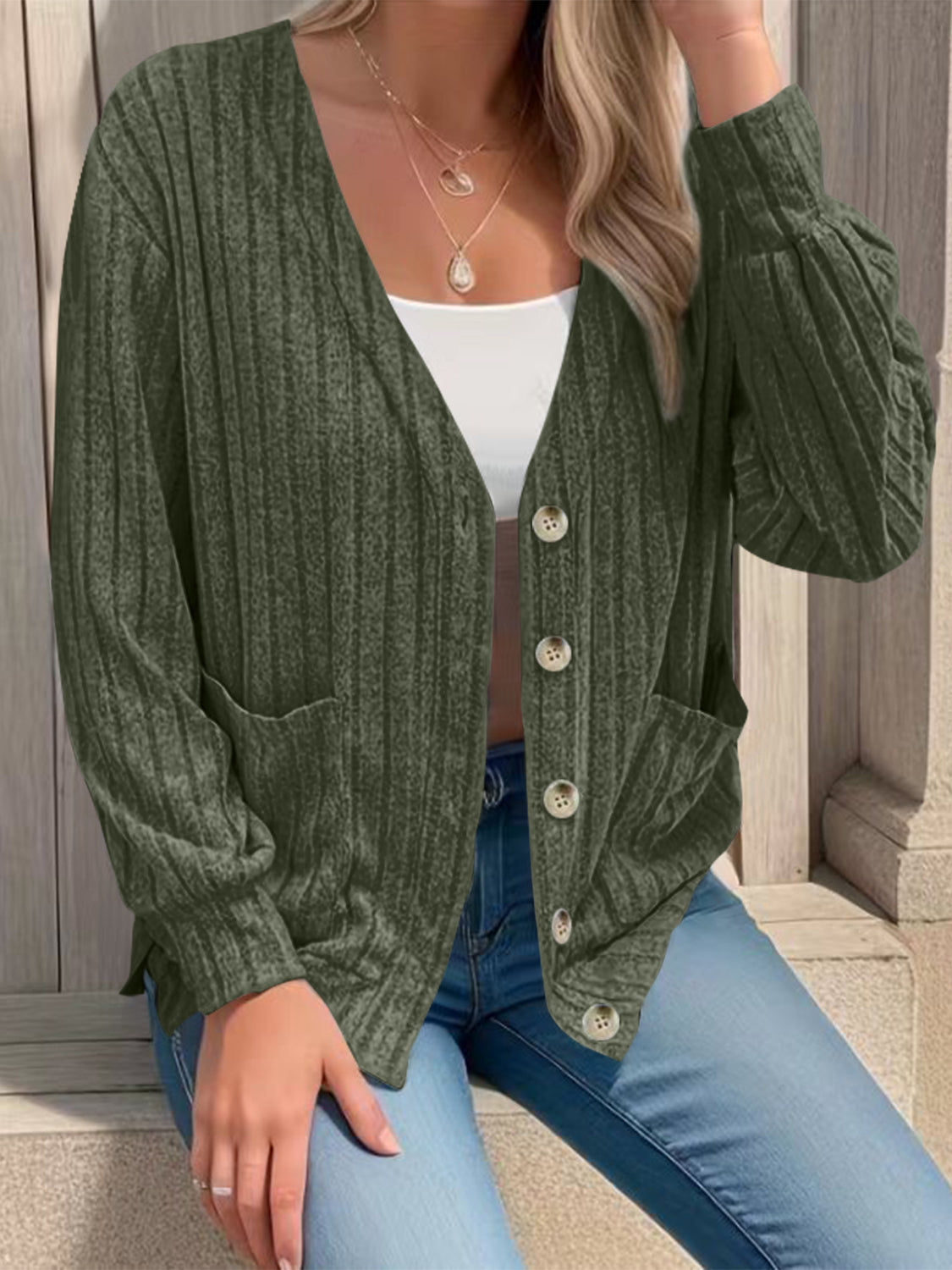 Full size button up V-neck long sleeve cardigan with pockets.