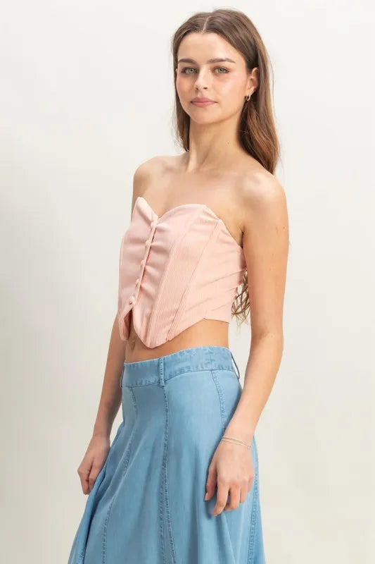Buttoned front strapless knit bustier top, slightly stretchy.