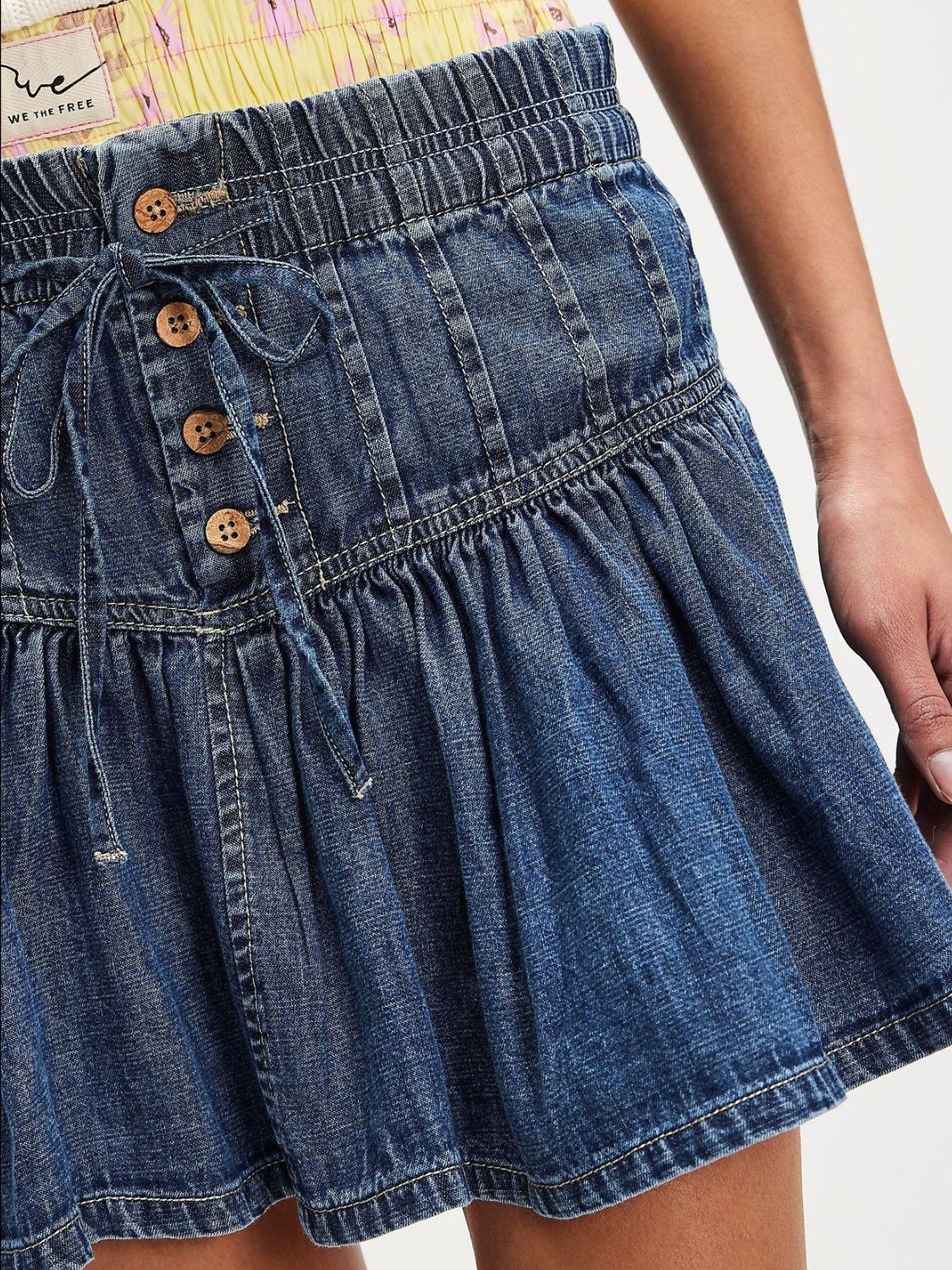 Buttoned Ruffled Mini Denim Skirt.