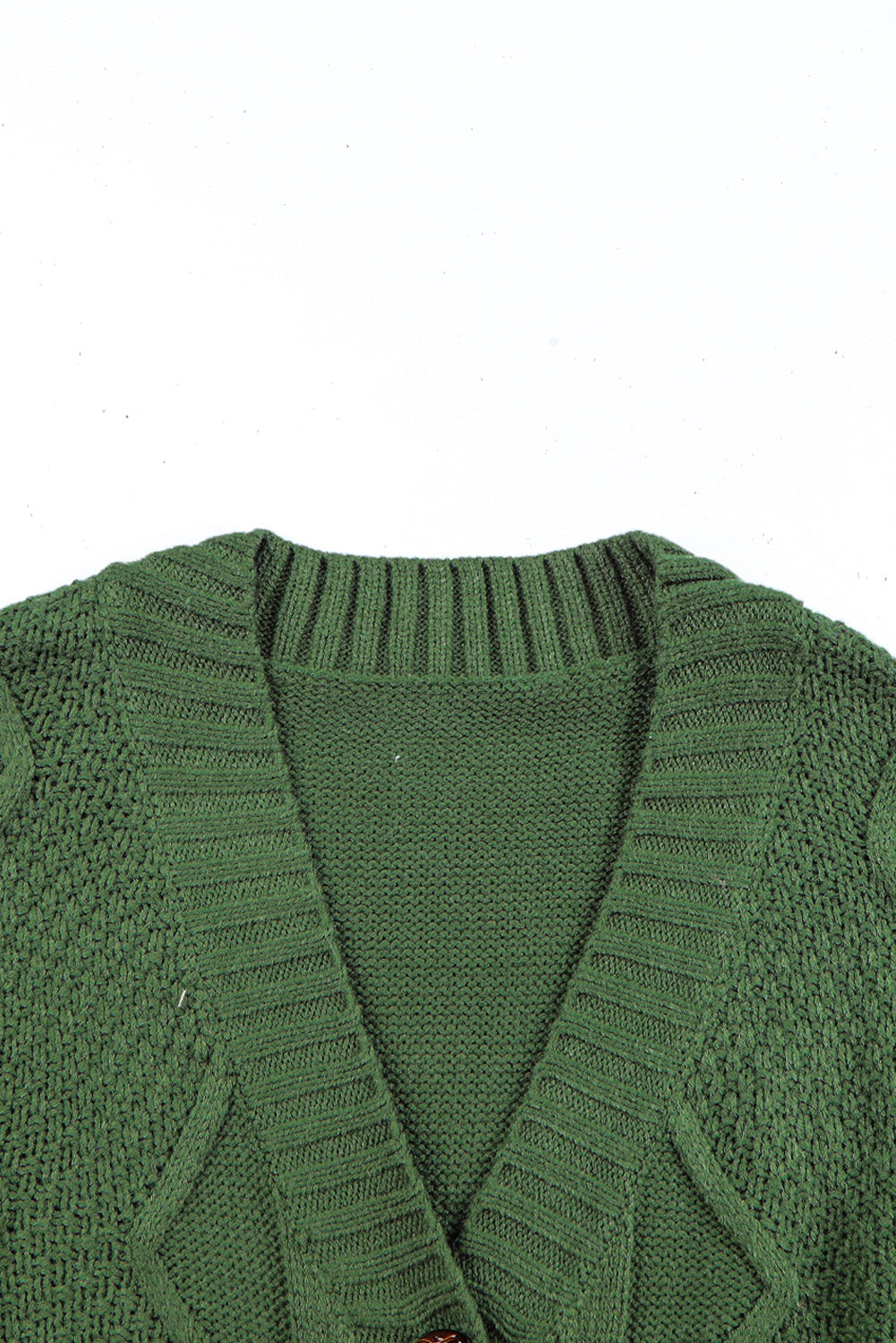 Cable-knit button down V-neck cardigan with pockets.