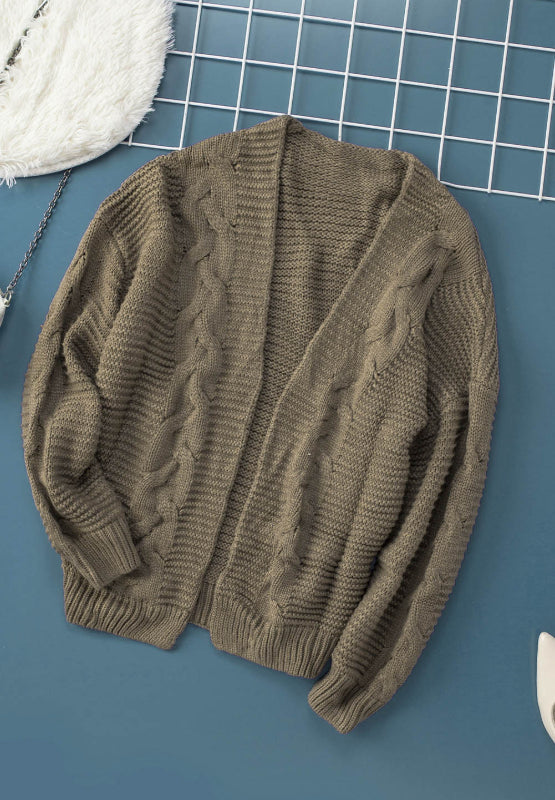 Cable-knit open front cardigan.