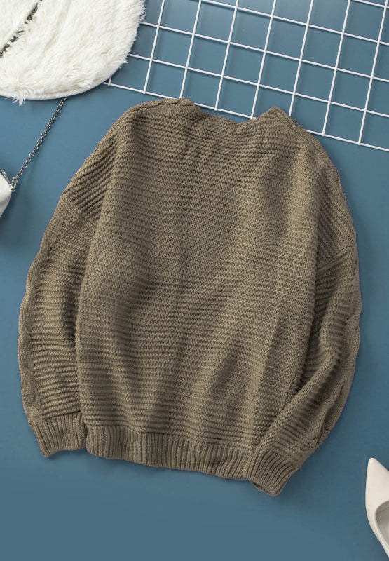Cable-knit open front cardigan.