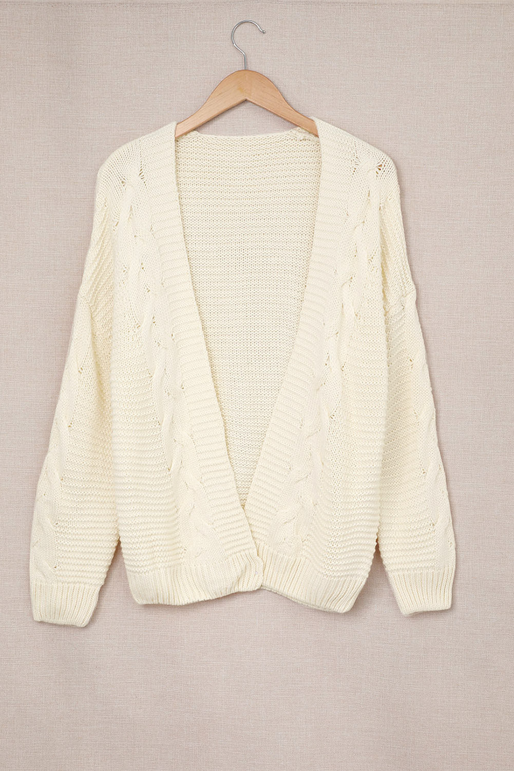 Cable-knit open front cardigan.