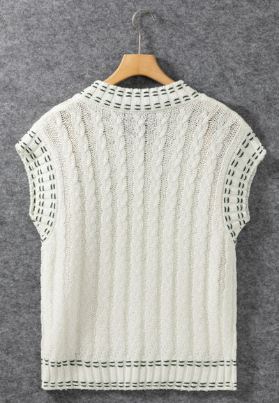 Cable-knit V-neck sweater vest.