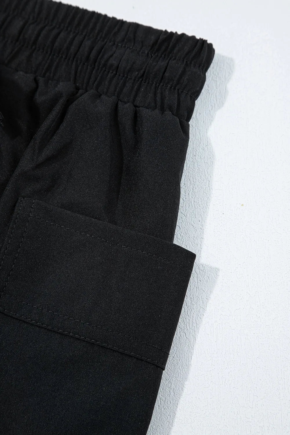 Cargo pocket elastic waist active casual skort with drawstring.