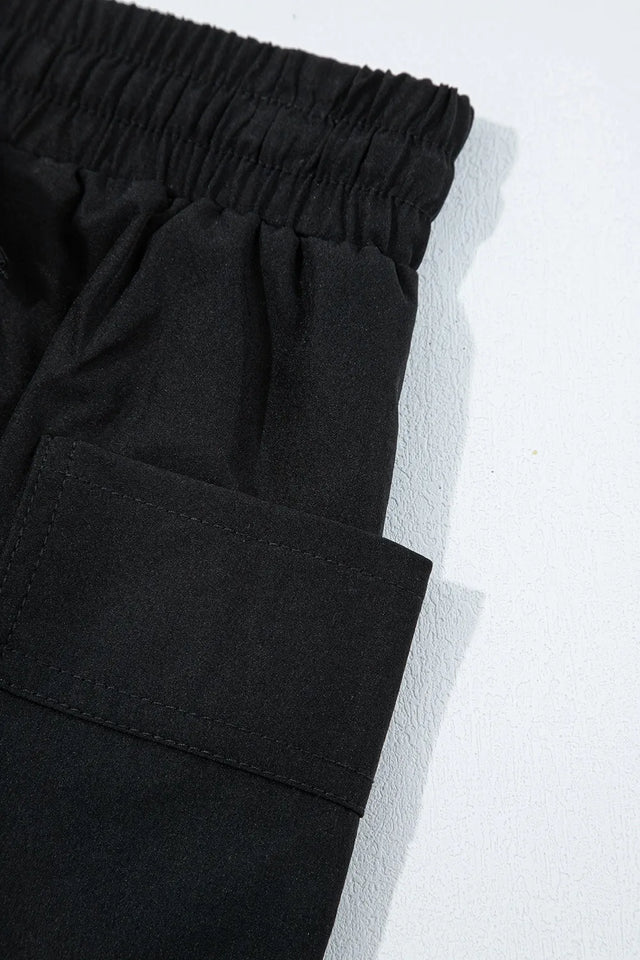 Cargo pocket elastic waist active casual skort with drawstring.