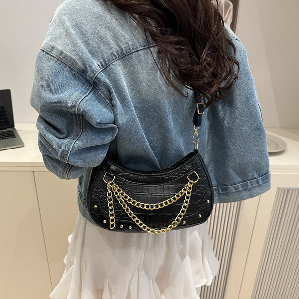 Small PU leather chain-embellished shoulder bag.