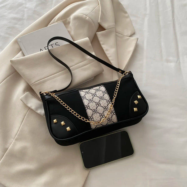 Small PU leather chain shoulder bag with studded details.