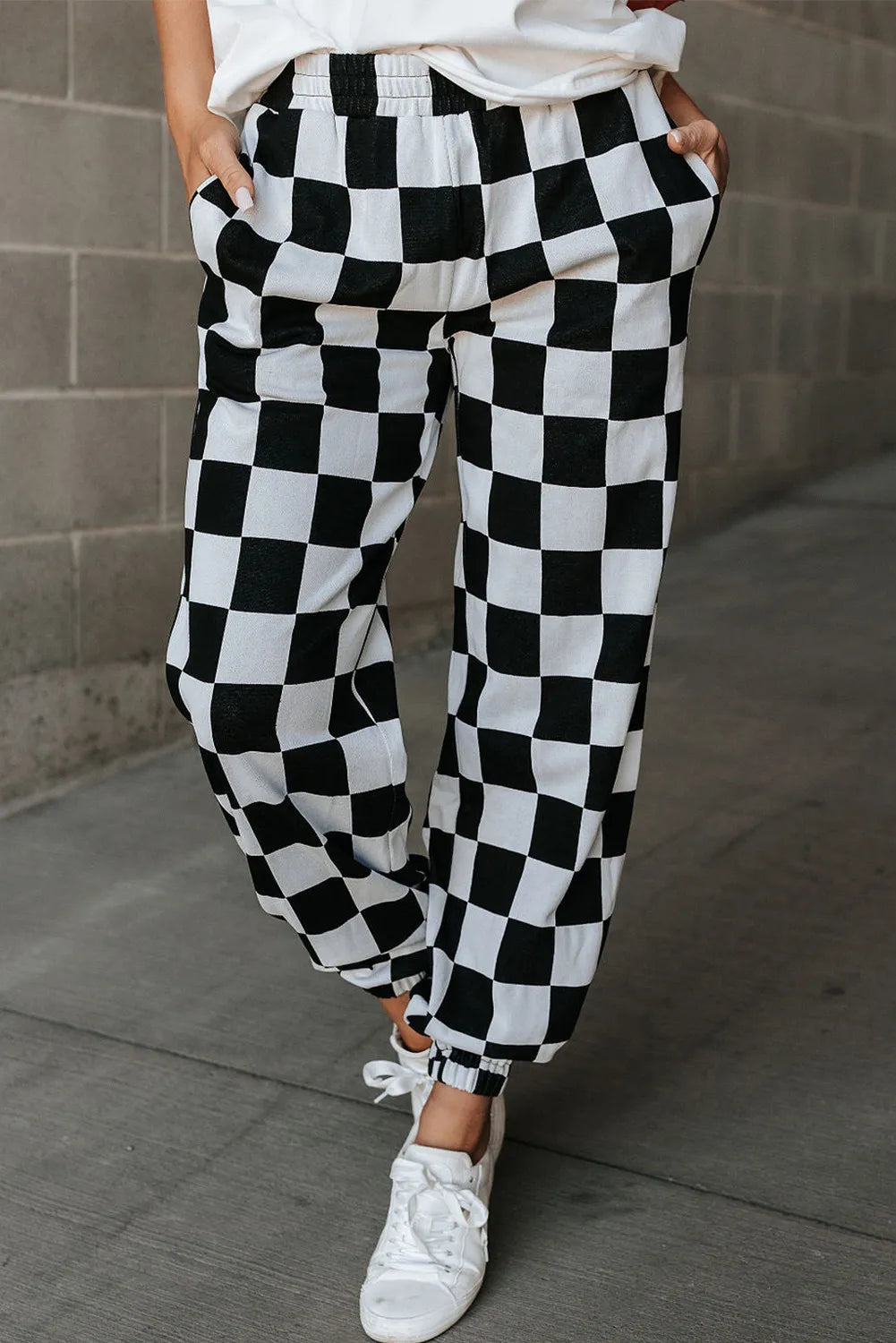Checkered elastic waist joggers with pockets, opaque.