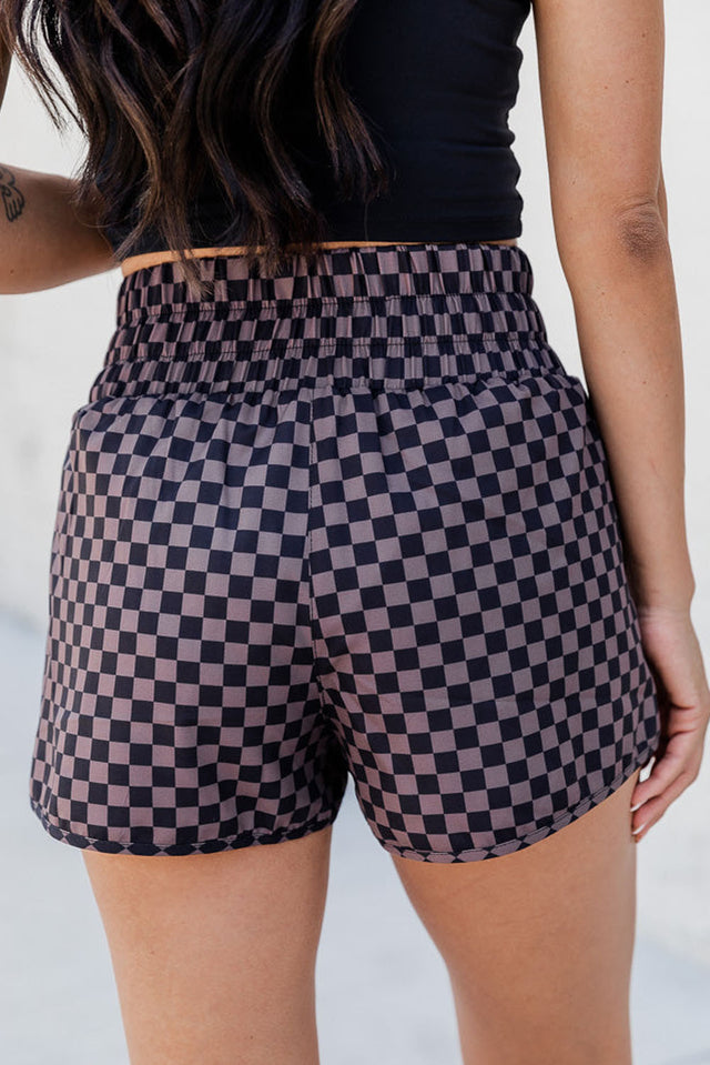 Checkered elastic waist shorts.