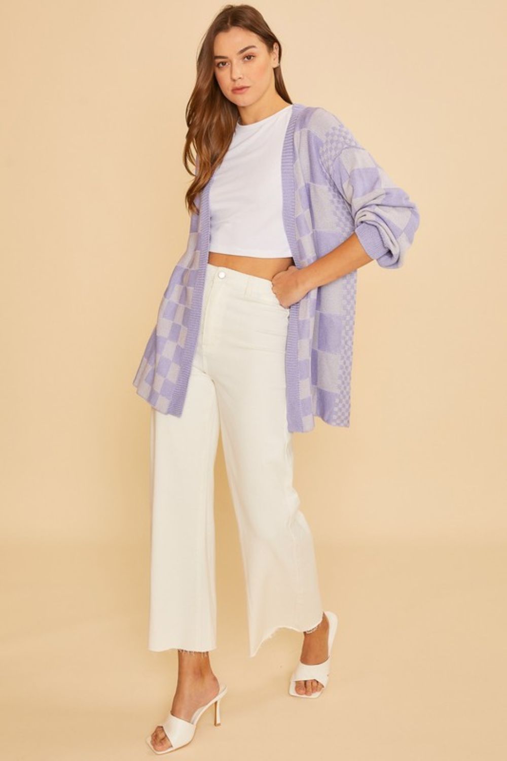 Checkered open front drop shoulder cardigan with ribbed details.