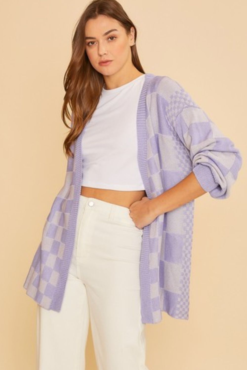 Checkered open front drop shoulder cardigan with ribbed details.