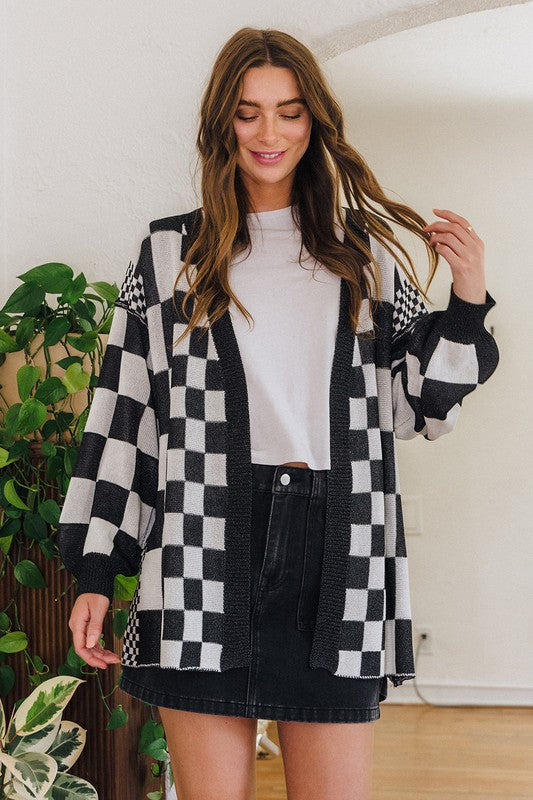 Checkered open front drop shoulder cardigan with ribbed details.