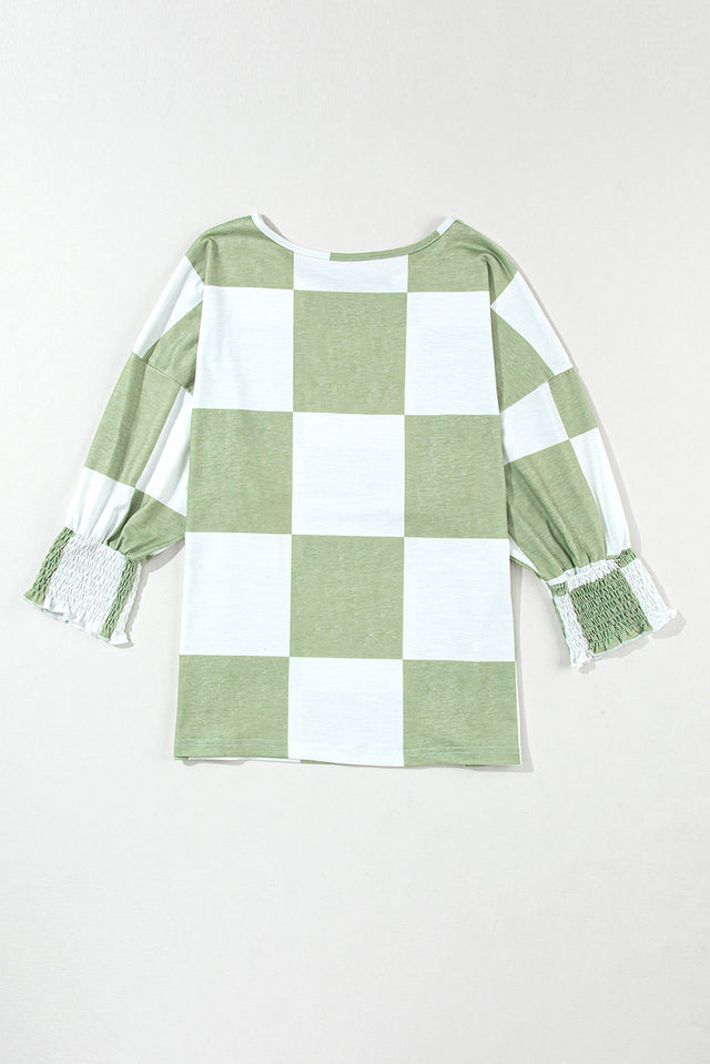 Checkered round neck lantern sleeve top with frill.