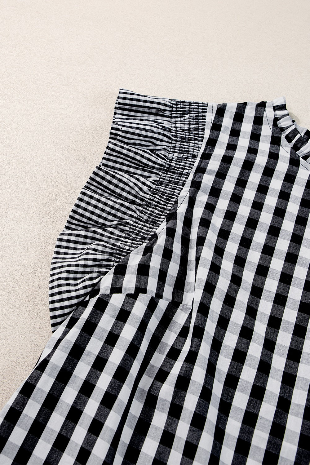Checkered ruffled sleeve frilled neck blouse.
