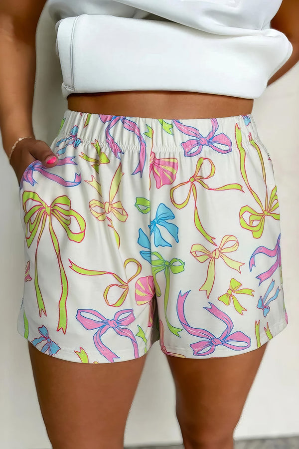 Women's cheerful bow print elastic pull-on casual shorts.