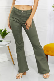 Clementine high-rise bootcut jeans in olive with pockets, moderate stretch.
