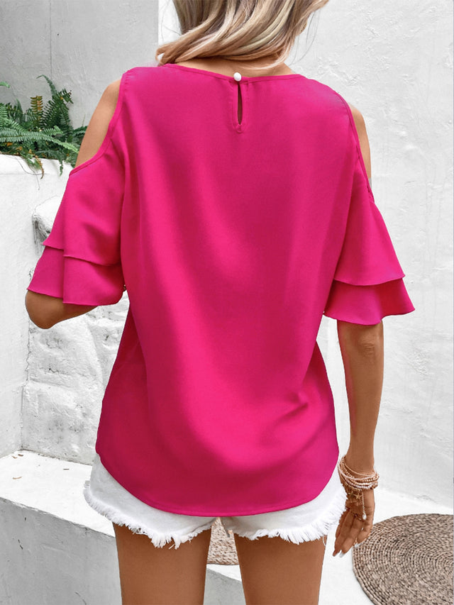 Cold shoulder flounce sleeve blouse with ruffles.