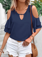 Cold shoulder flounce sleeve blouse with ruffles.
