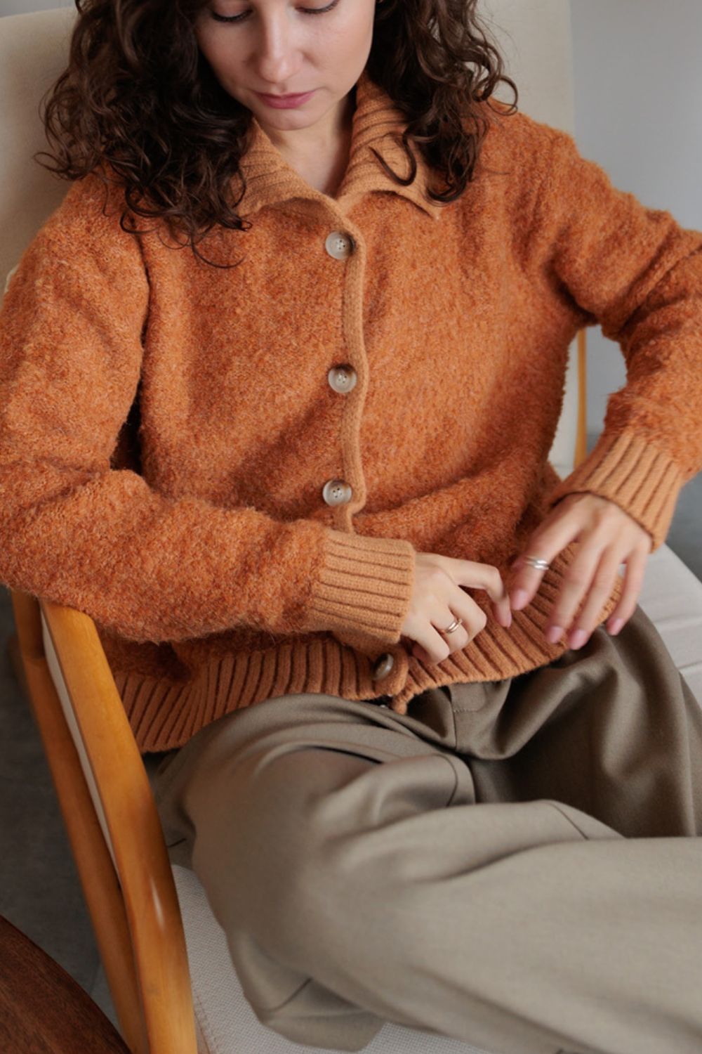 Collared neck button down long sleeve cardigan.