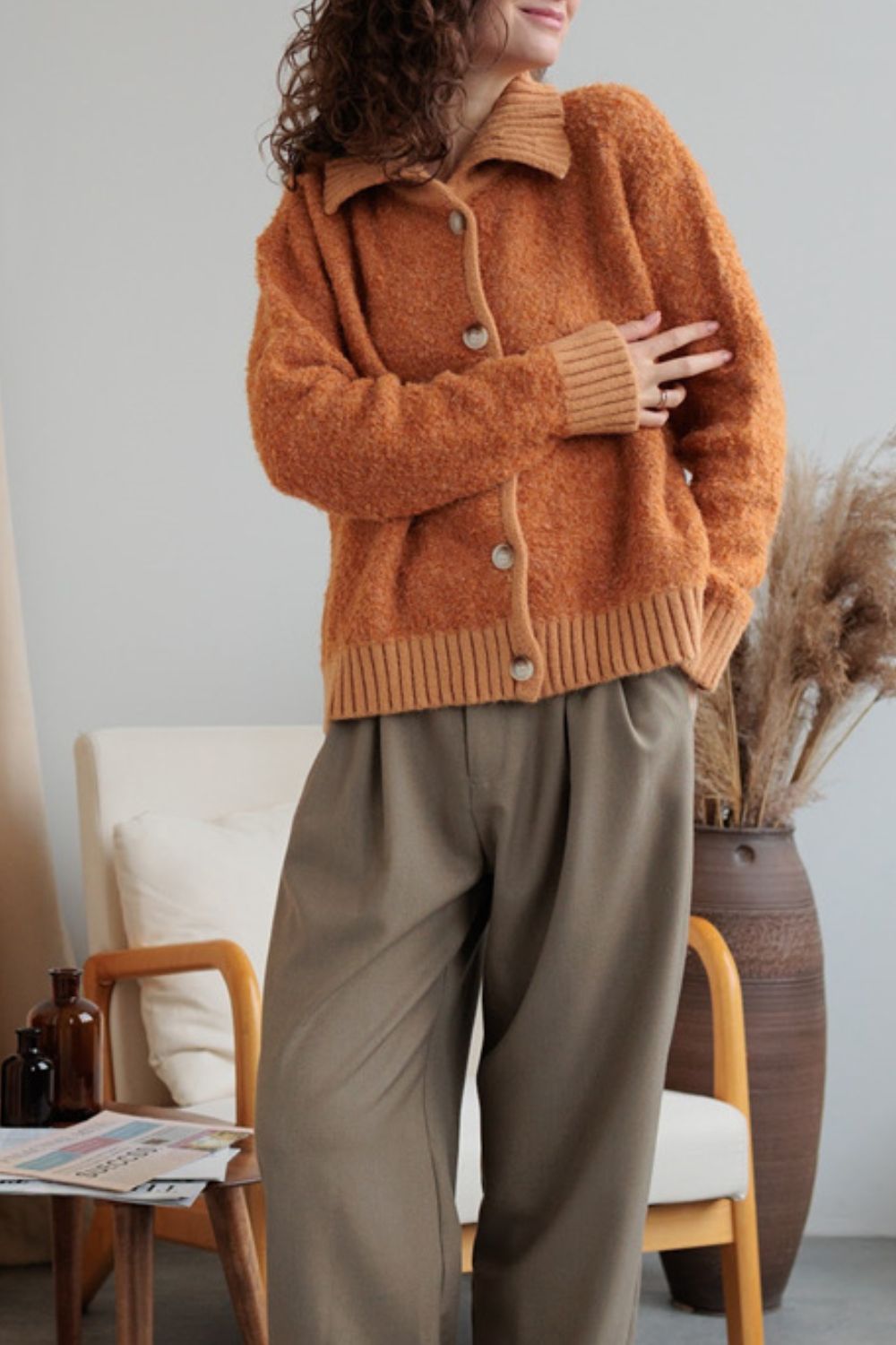 Collared neck button down long sleeve cardigan.