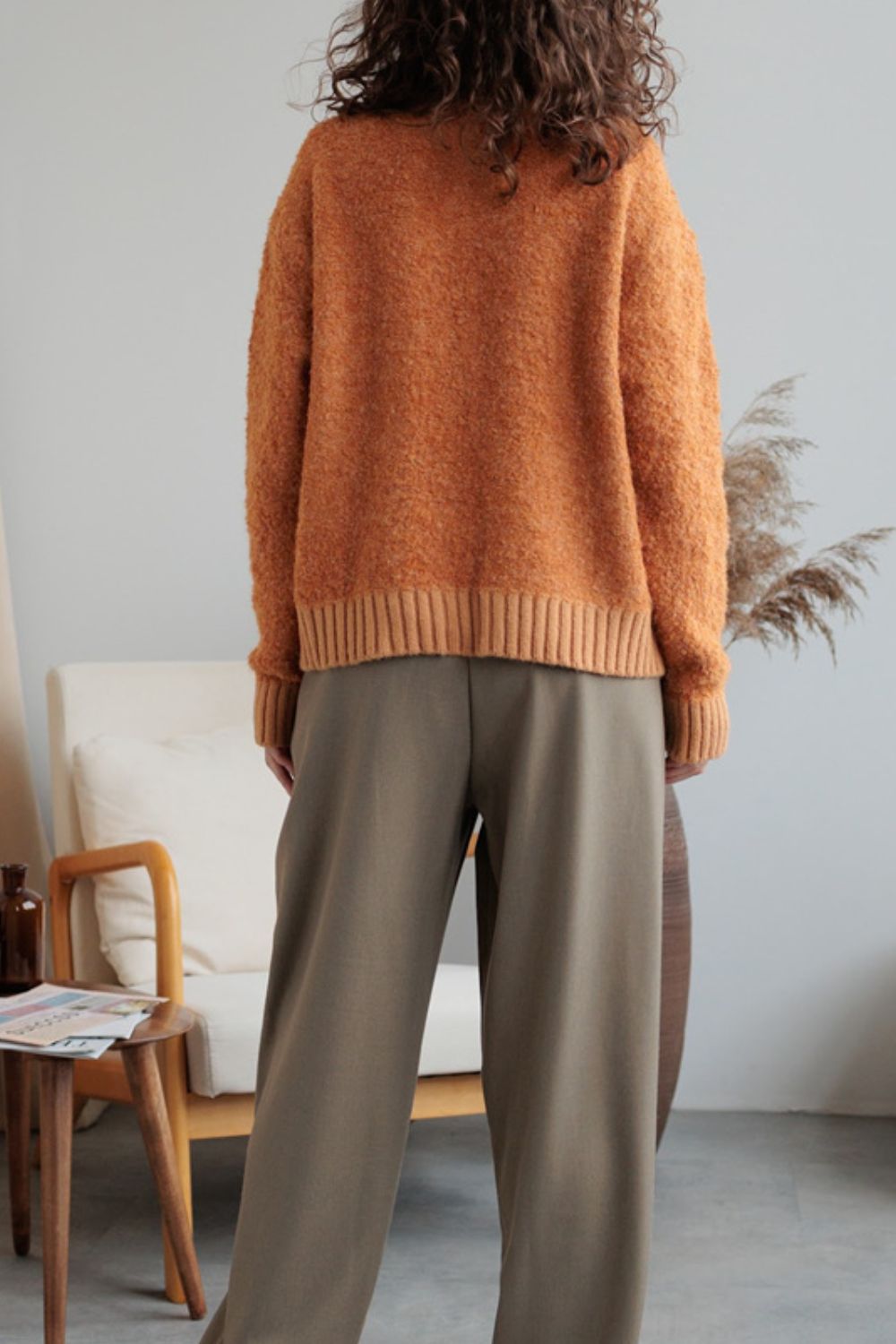 Collared neck button down long sleeve cardigan.