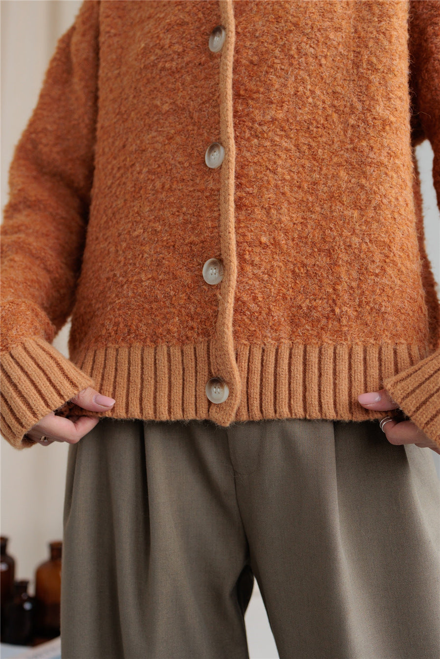 Collared neck button down long sleeve cardigan.