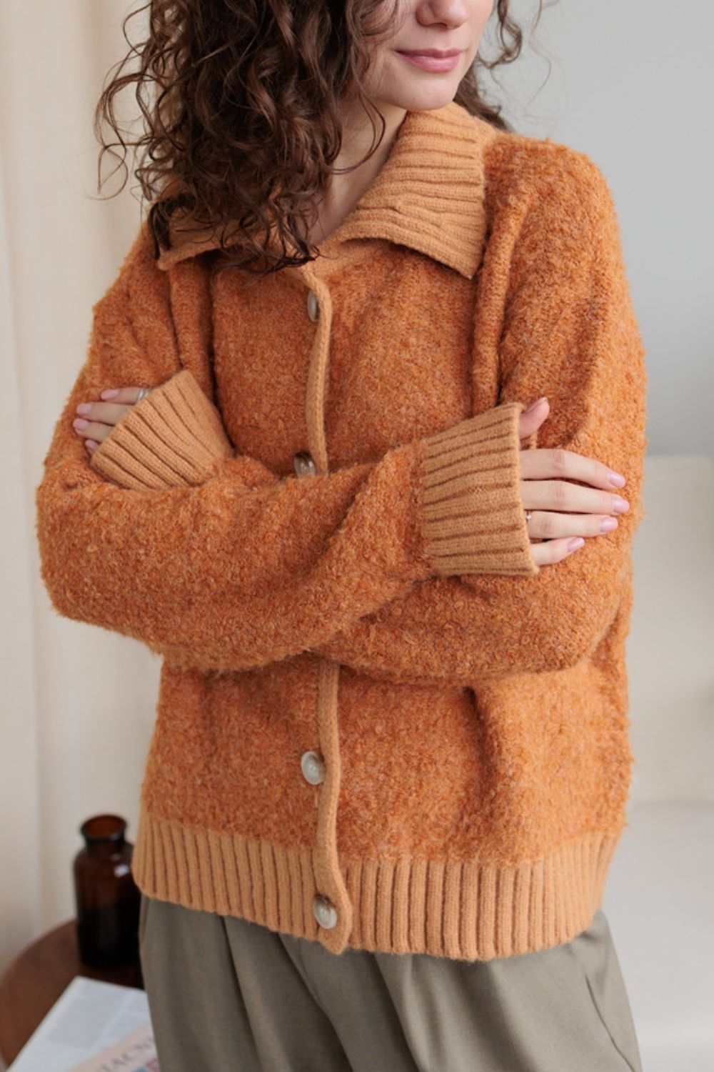 Collared neck button down long sleeve cardigan.
