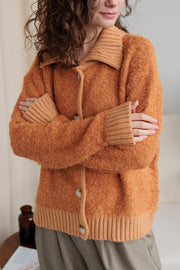 Collared neck button down long sleeve cardigan.