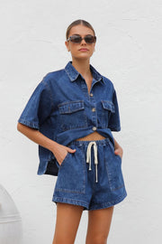 Women's collared neck button-up top and shorts denim set