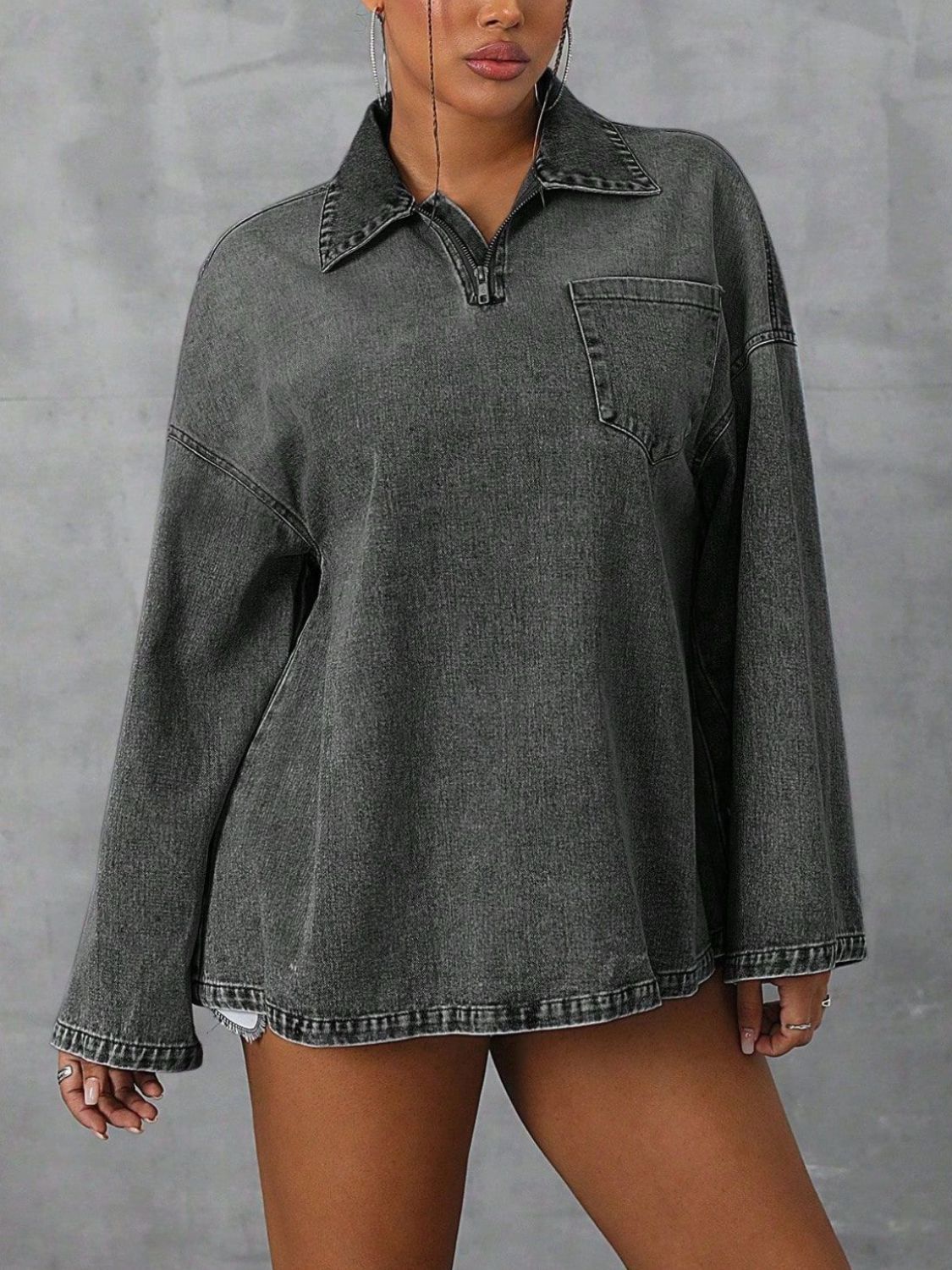 Collared neck drop shoulder denim top with pockets.