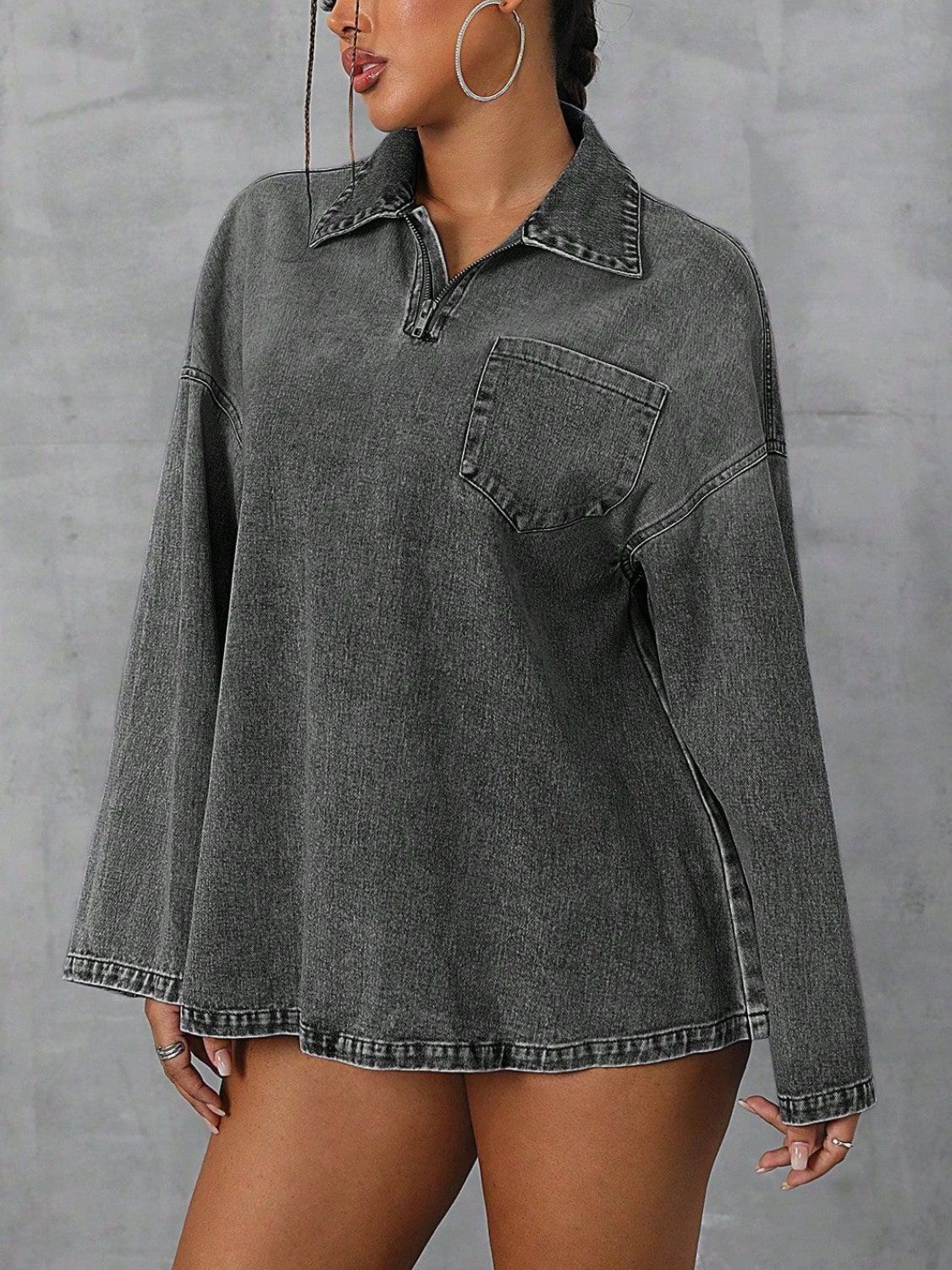 Collared neck drop shoulder denim top with pockets.