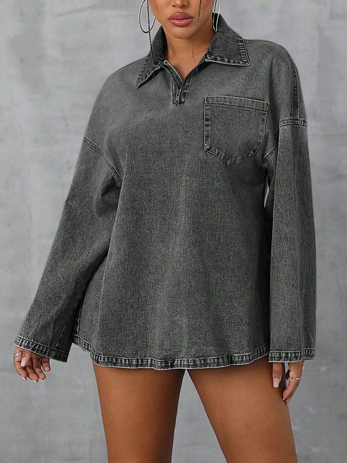 Collared neck drop shoulder denim top with pockets.